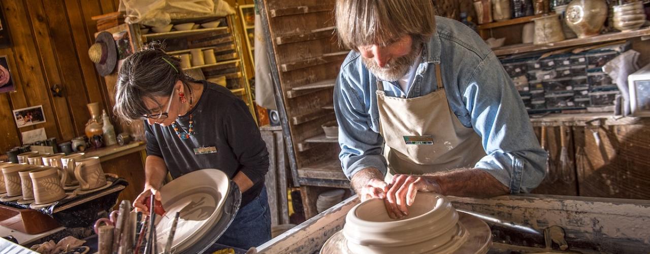 artisans making pottery